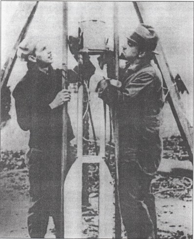 Frank Pierce and G. Pendray preparing their rocket